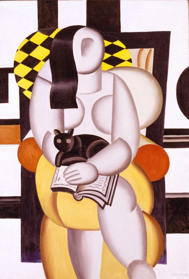 Cubist figure seated with an open book while a small black cat perches on the pages.