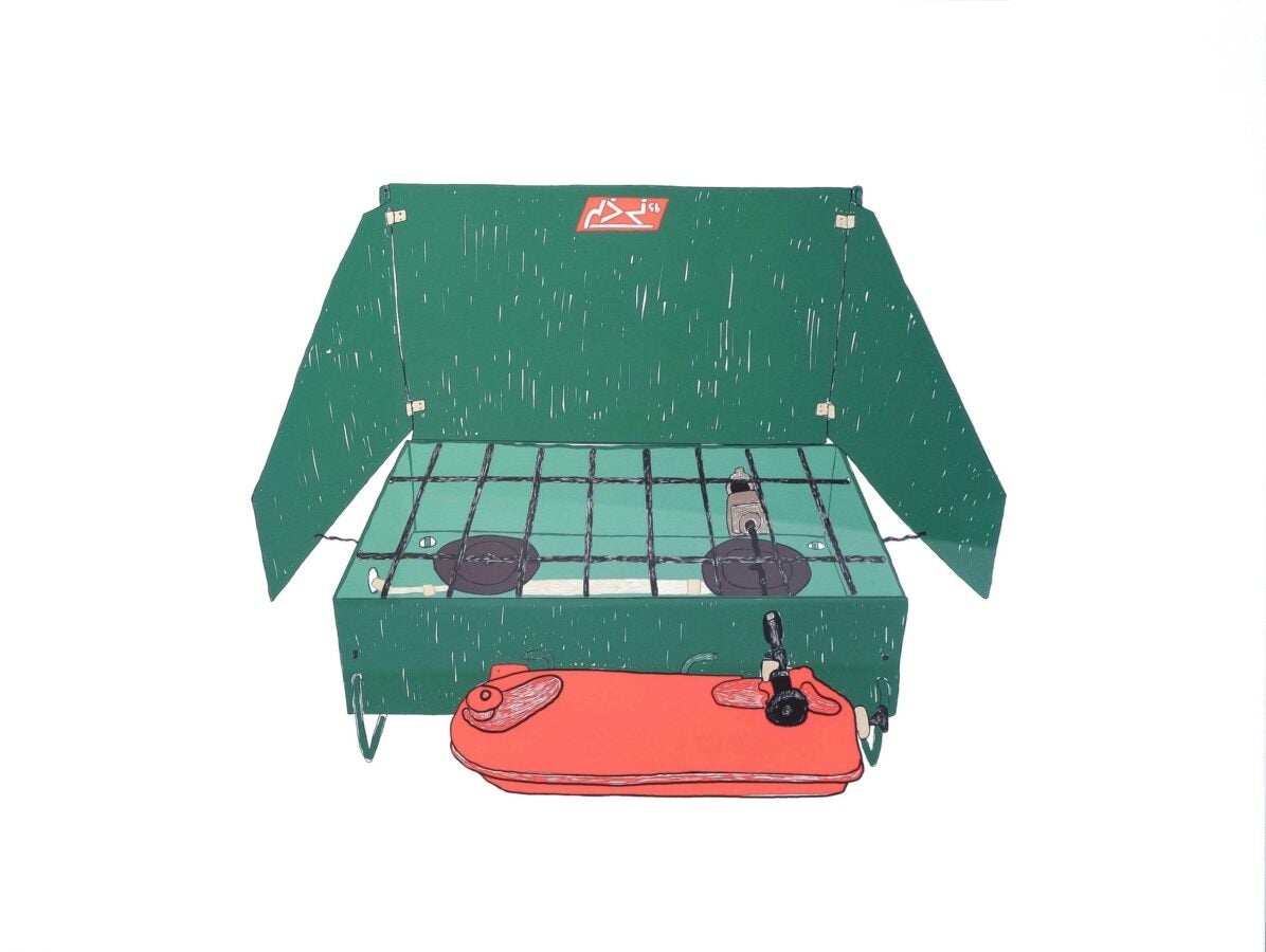 Digital illustration of a green and red Coleman camp stove with its lid open and burners exposed. The stove sits on a plain white background and evokes the familiarity of cooking equipment used in northern communities.